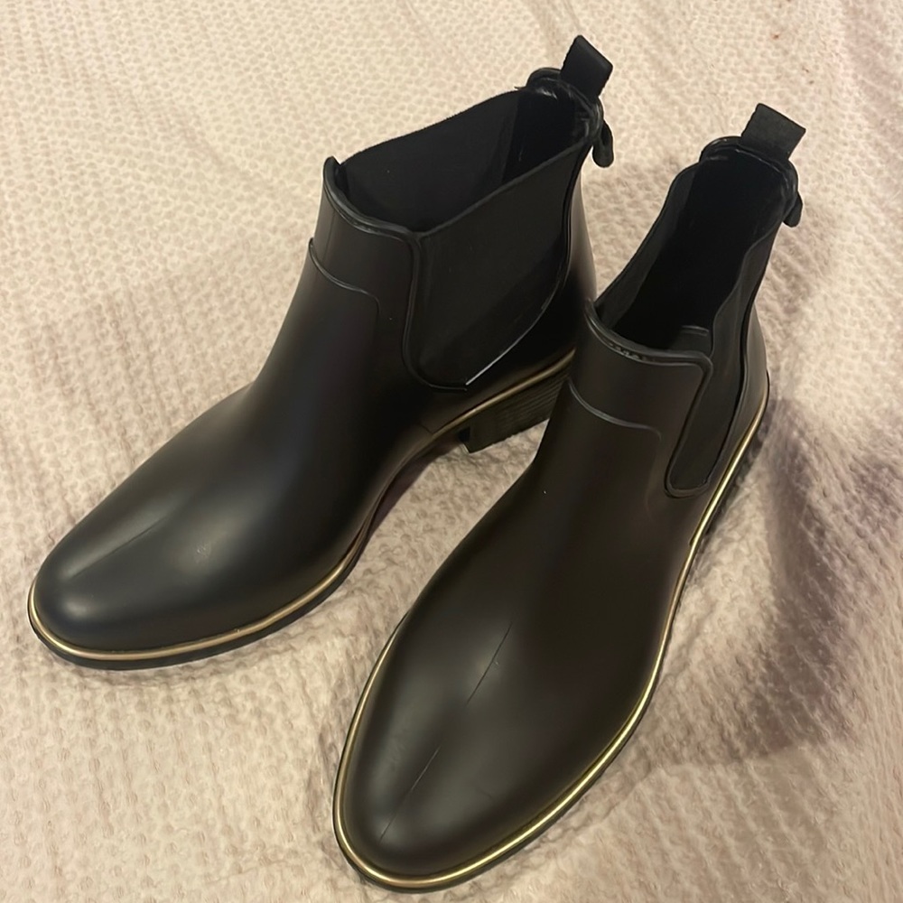 Kate Spade New York's Star Chelsea-style boots with gleaming gold-tone trim